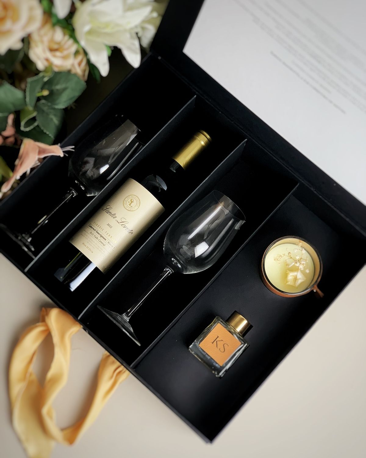 Couples luxury gift box with gold ribbon and brand presentation